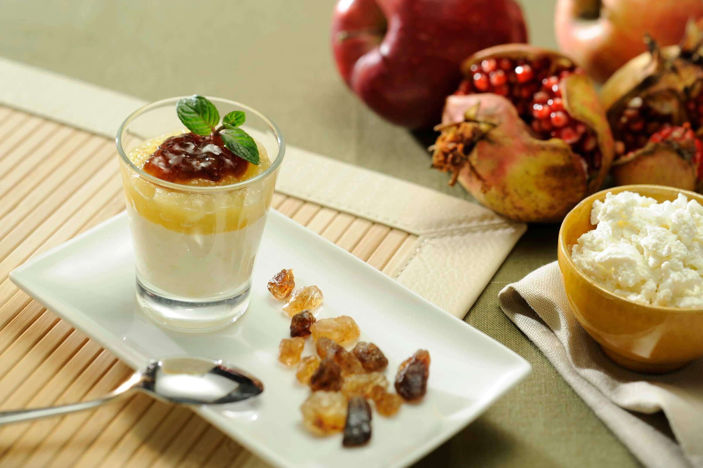 Glass of Seirass and apple with pomegranate jelly