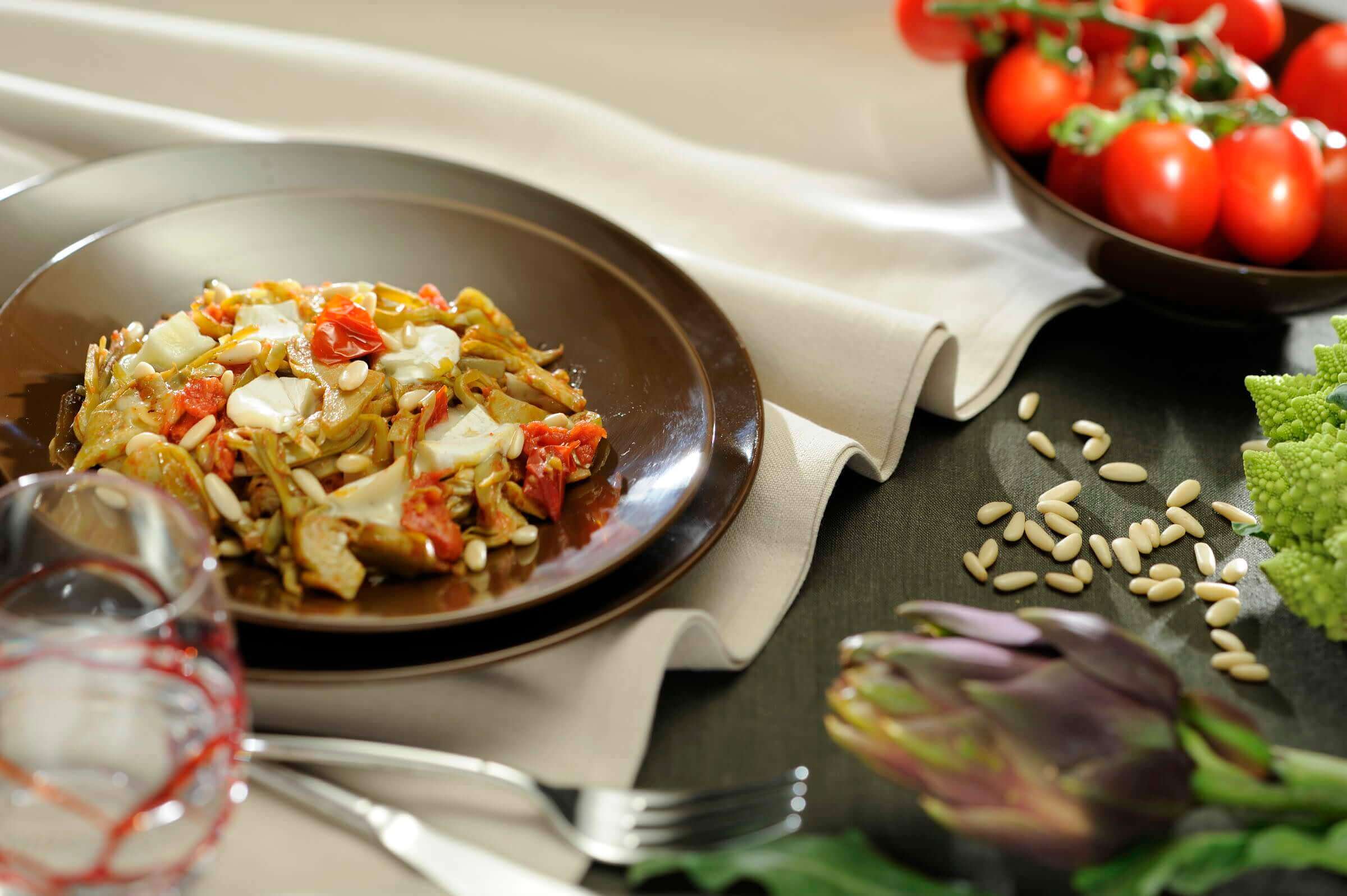 Cooked artichoke, fresh tomato and Tomino salad