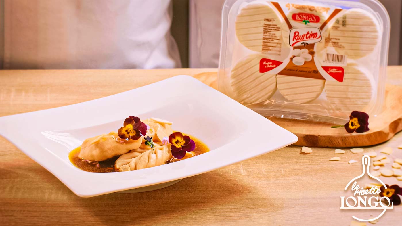 Steamed ravioli with Rustino Longo, soy carrots and roasted almonds 